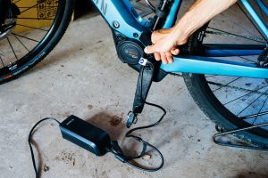 What is the proper way to charge an e-bike?